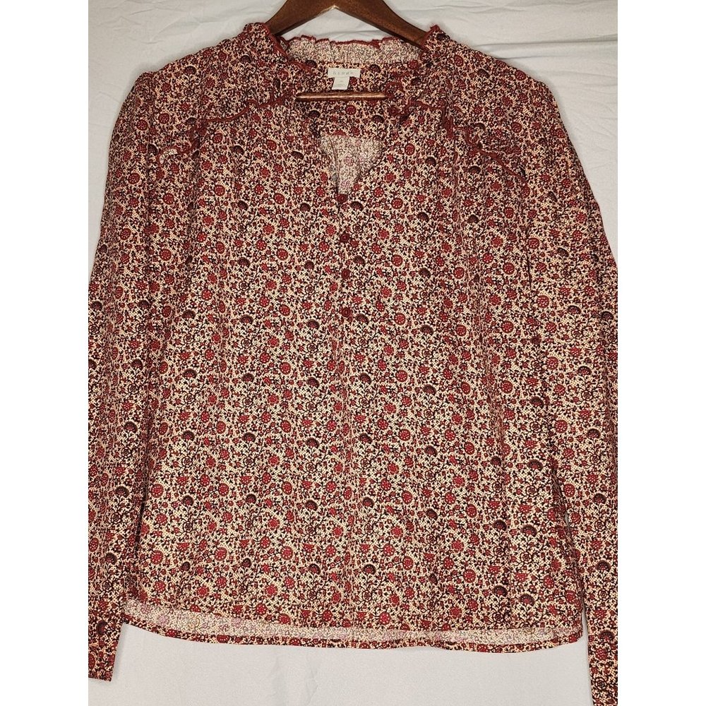 Hinge Navy and rust with orange and yellow floral print long sleeved blouse. Ruf